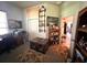 Home office with built-in cabinets and a view of the backyard at 4880 Bannon Island Rd, Haines City, FL 33844