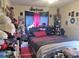 Spacious bedroom with a double bed and window coverings at 323 Dorsett Ave, Lake Wales, FL 33853