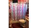 Bathroom with pink vanity, shower, and toilet at 323 Dorsett Ave, Lake Wales, FL 33853