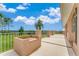 Large patio with built-in fire pit and scenic views at 3082 Landings Ct, Haines City, FL 33844