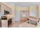 Kitchen boasts stainless steel appliances and ample counter and cabinet space at 3082 Landings Ct, Haines City, FL 33844