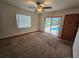 Bedroom with pool view and sliding doors at 292 Hernando Rd, Winter Haven, FL 33884