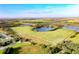 Aerial view of expansive property with lake access at 600 Sundown Dr, Lake Wales, FL 33859