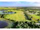 Wide aerial view of expansive property near lake and schools at 600 Sundown Dr, Lake Wales, FL 33859