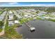 Aerial view of community boat docks on the lake at 6739 Kensington Ne Dr, Winter Haven, FL 33881