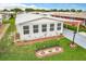 Aerial view of home and landscaped yard at 6739 Kensington Ne Dr, Winter Haven, FL 33881