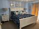 Spacious Primary bedroom with large bed and ensuite bathroom at 2213 Mallory Cir, Haines City, FL 33844