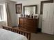 Spacious bedroom with dresser and large bed at 2213 Mallory Cir, Haines City, FL 33844