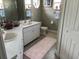 Bathroom with double vanity and a shower at 2213 Mallory Cir, Haines City, FL 33844