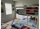 Bedroom with bunk bed and playful decor at 2213 Mallory Cir, Haines City, FL 33844