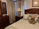 Bright bedroom with a comfortable bed and nightstand at 2213 Mallory Cir, Haines City, FL 33844