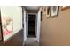 Bright hallway with access to bedrooms at 2213 Mallory Cir, Haines City, FL 33844
