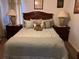Bedroom with a queen bed and nightstands at 2213 Mallory Cir, Haines City, FL 33844