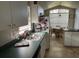 Kitchen with dark countertops and white cabinets at 2213 Mallory Cir, Haines City, FL 33844
