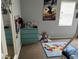 Bedroom with a dresser and US map rug at 2213 Mallory Cir, Haines City, FL 33844