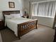 Guest bedroom with a queen-size bed and window at 2213 Mallory Cir, Haines City, FL 33844