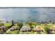 Lakefront property with lush landscaping and private dock at 514 Hillside Dr, Auburndale, FL 33823