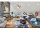 Spacious living room featuring a stone fireplace and hardwood floors at 514 Hillside Dr, Auburndale, FL 33823