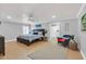 Spacious main bedroom with wood floors and an ensuite bathroom at 514 Hillside Dr, Auburndale, FL 33823