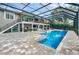 Inviting pool area with a screened enclosure at 514 Hillside Dr, Auburndale, FL 33823