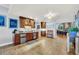 Convenient wet bar with cabinetry, a sink, and a mini-fridge at 514 Hillside Dr, Auburndale, FL 33823