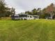 Mobile home on a large lot with RV and sheds at 5490 Morgan Rd, Lakeland, FL 33810