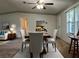 Dining area with table and chairs, carpeted floor, and ceiling fan at 5490 Morgan Rd, Lakeland, FL 33810