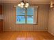 Bright dining room with wood flooring and a view from two windows at 5490 Morgan Rd, Lakeland, FL 33810