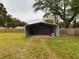 Open-faced metal shed for extra storage at 5490 Morgan Rd, Lakeland, FL 33810