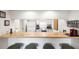 Clean kitchen features a breakfast bar with seating and white cabinetry at 2070/2071 Corner Lake Dr # 2, Haines City, FL 33844