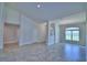 Dining room with tile floors and views to the living room at 4024 Tullamore Ln, Auburndale, FL 33823