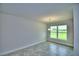 Bright dining room with tile floors and view of backyard at 4024 Tullamore Ln, Auburndale, FL 33823