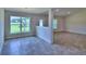 Open concept dining area with tile floors and natural light at 4024 Tullamore Ln, Auburndale, FL 33823