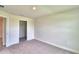 Bedroom with closet and access to bathroom at 4024 Tullamore Ln, Auburndale, FL 33823