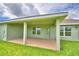 Covered patio with beige flooring at 4024 Tullamore Ln, Auburndale, FL 33823