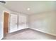 Spacious bedroom with double door closet and neutral decor at 4024 Tullamore Ln, Auburndale, FL 33823