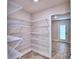Walk-in pantry with adjustable wire shelving at 4024 Tullamore Ln, Auburndale, FL 33823
