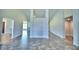 Spacious foyer with high ceilings and tile floors at 4024 Tullamore Ln, Auburndale, FL 33823