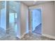 Bright hallway with tile floors and access to rooms at 4024 Tullamore Ln, Auburndale, FL 33823