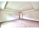 Spacious main bedroom with carpeted floor and large window at 4024 Tullamore Ln, Auburndale, FL 33823