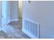Clean hallway with tile flooring and access to other rooms at 4024 Tullamore Ln, Auburndale, FL 33823