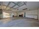 Large garage with ample storage space and workbench at 3860 E Gaskins Rd, Bartow, FL 33830