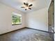 Bright bedroom with neutral wall paint and ceiling fan at 547 S Hankin Rd, Bartow, FL 33830