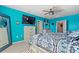 Spacious Primary bedroom with teal walls, a large bed, and ample storage at 856 Sun Burst Rd, Winter Haven, FL 33880