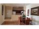Dining area with table and chairs adjacent to kitchen at 8010 Tuscany Way # 5308, Davenport, FL 33896