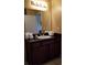 Bathroom with granite countertop and single sink vanity at 8010 Tuscany Way # 5308, Davenport, FL 33896