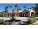 Tuscana community entrance with fountain and palm trees at 8010 Tuscany Way # 5308, Davenport, FL 33896
