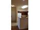 Kitchen with wood cabinets, granite countertops, and appliances at 8010 Tuscany Way # 5308, Davenport, FL 33896