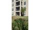 Building exterior view, showcasing landscaping and building design at 8010 Tuscany Way # 5308, Davenport, FL 33896
