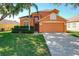 Image 1 of 77: 17717 Woodcrest Way, Clermont